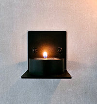 Lämpökynttiläteline seinälle