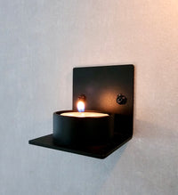 Lämpökynttiläteline seinälle